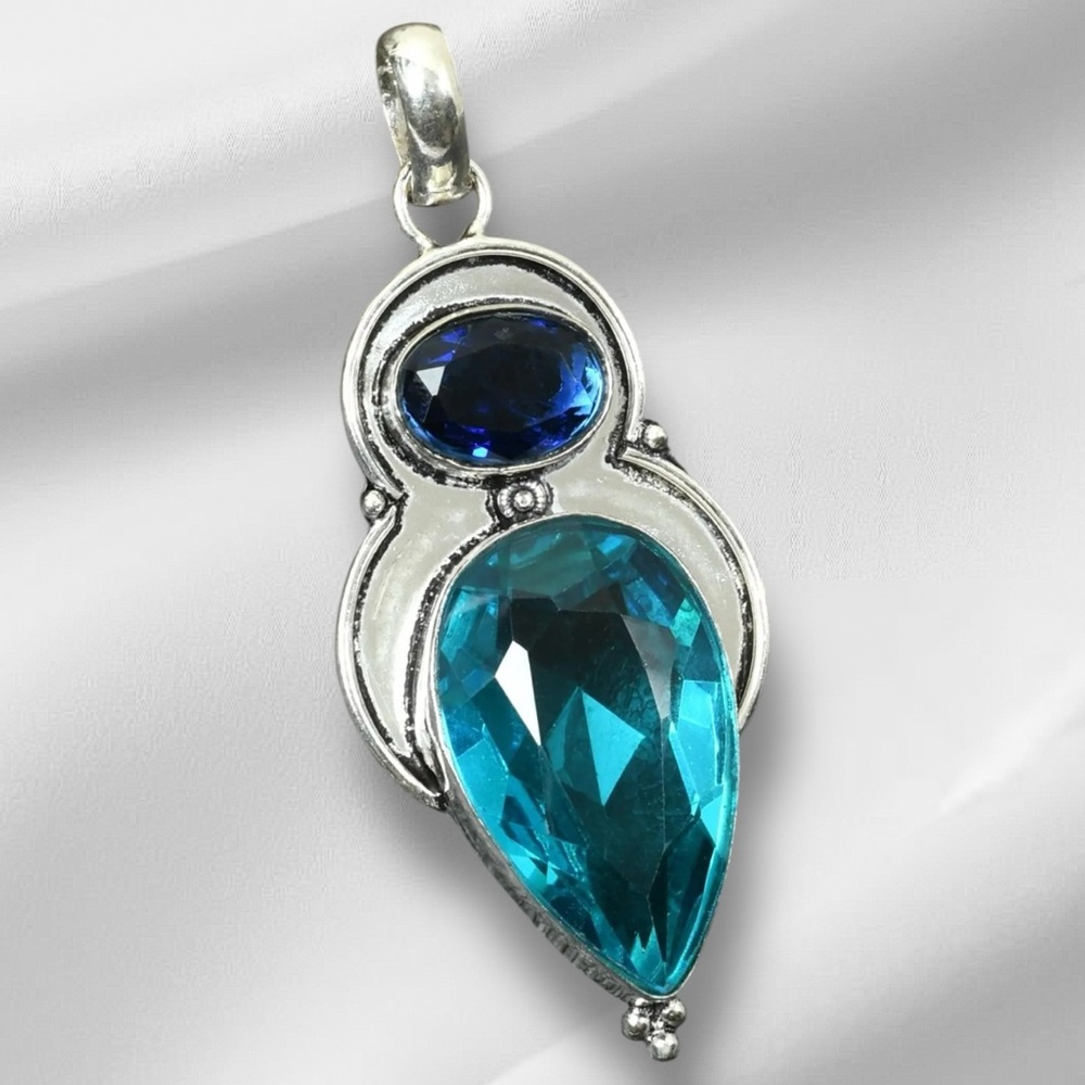 Artisan Hand Crafted Teardrop Pendant Necklace - Brilliant Blue Topaz in Silver